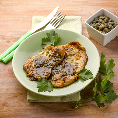 Schnitzel de dinde avec mayo câpres, citron et tomates au feta