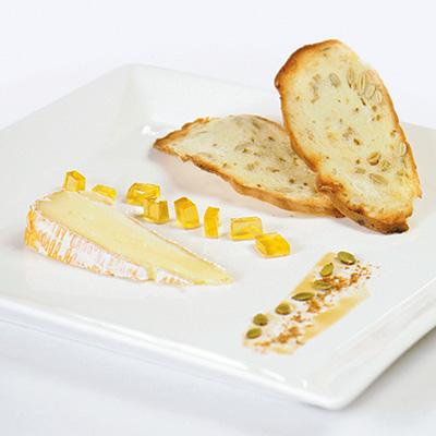 Kénogami Cheese with Ice Cider Jelly, Apple Wort Reduction, Toast and Cumin and Pumpkin Seeds