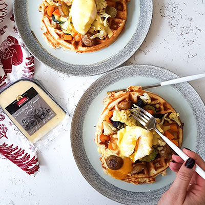 Eggs Benedict with Grilled Vegetables on Cheese and Bacon Waffles